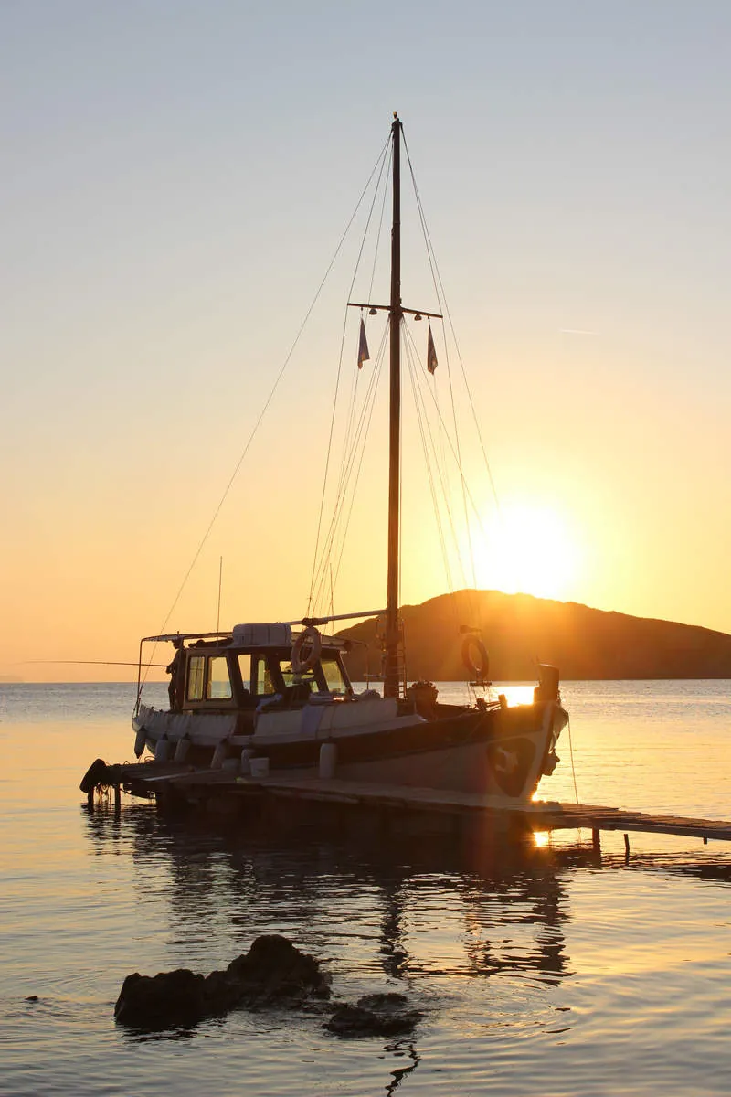 Artemida at anchor at sunset